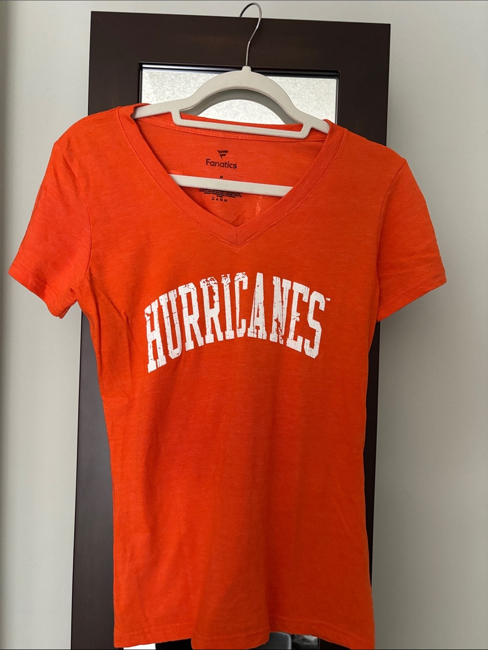 Fanatics Women's Hurricanes V-Neck Tee in Orange with White Lettering